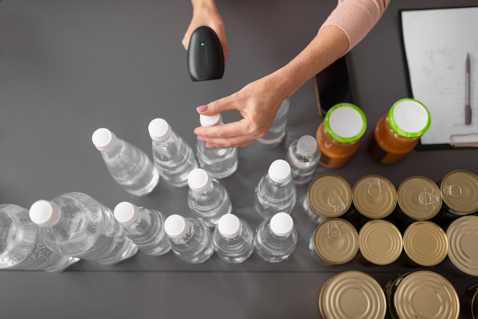 volunteer-scanning-food-donations-charity